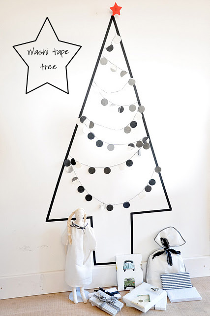 Christmas tree decoration - this simple homemade idea for a Scandinavian style DIY Christmas wall decoration combines both traditional and modern themes and in white, silver and gold is both elegant and adorable for kids and uses nothing more than washi tape and homemade christmas bunting #christmas #christmasdecoration #christmastrees #homemadechristmas #washitape #simpleChristmas #Scandinavian #christmasideas