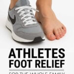 Feet of teenage boy, one wearing a sneaker, one bare