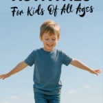 Young boy balancing on a log