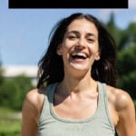 Smiling woman outdoors on a sunny day