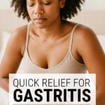 Woman holding her stomach in pain