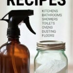 Amber spray bottle, mason jar of baking soda and a cut lemon on a kitchen work top