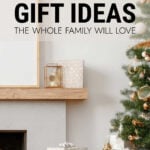 Christmas presents under Christmas trees next to fireplace