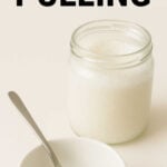 Jar and bowl of coconut oil with spoon