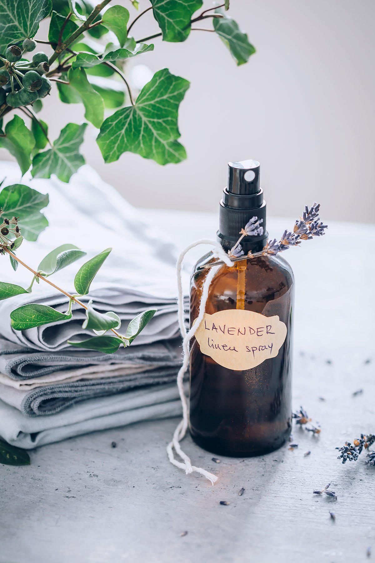 Blue bottle of DIY lavender linen spray