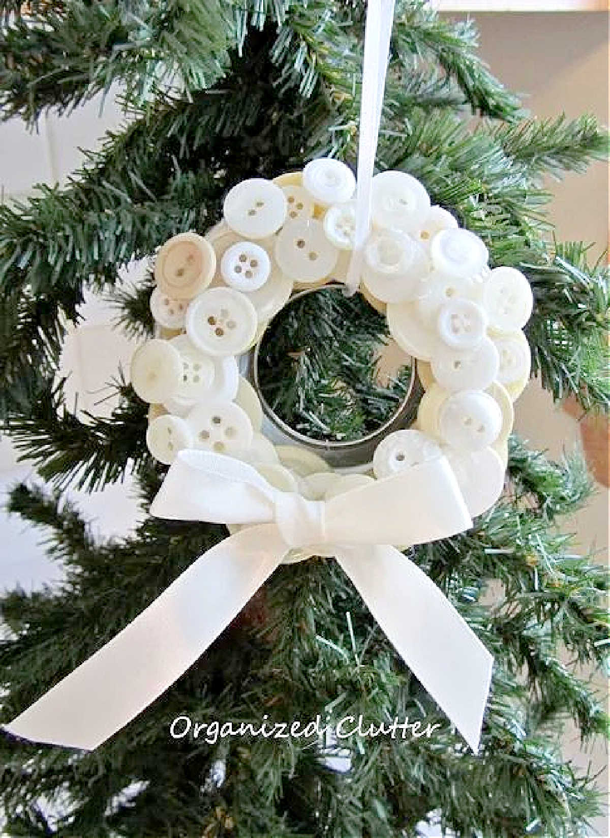 Mini Christmas wreath ornament made from buttons