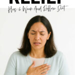 Woman holding her chest with heartburn pain