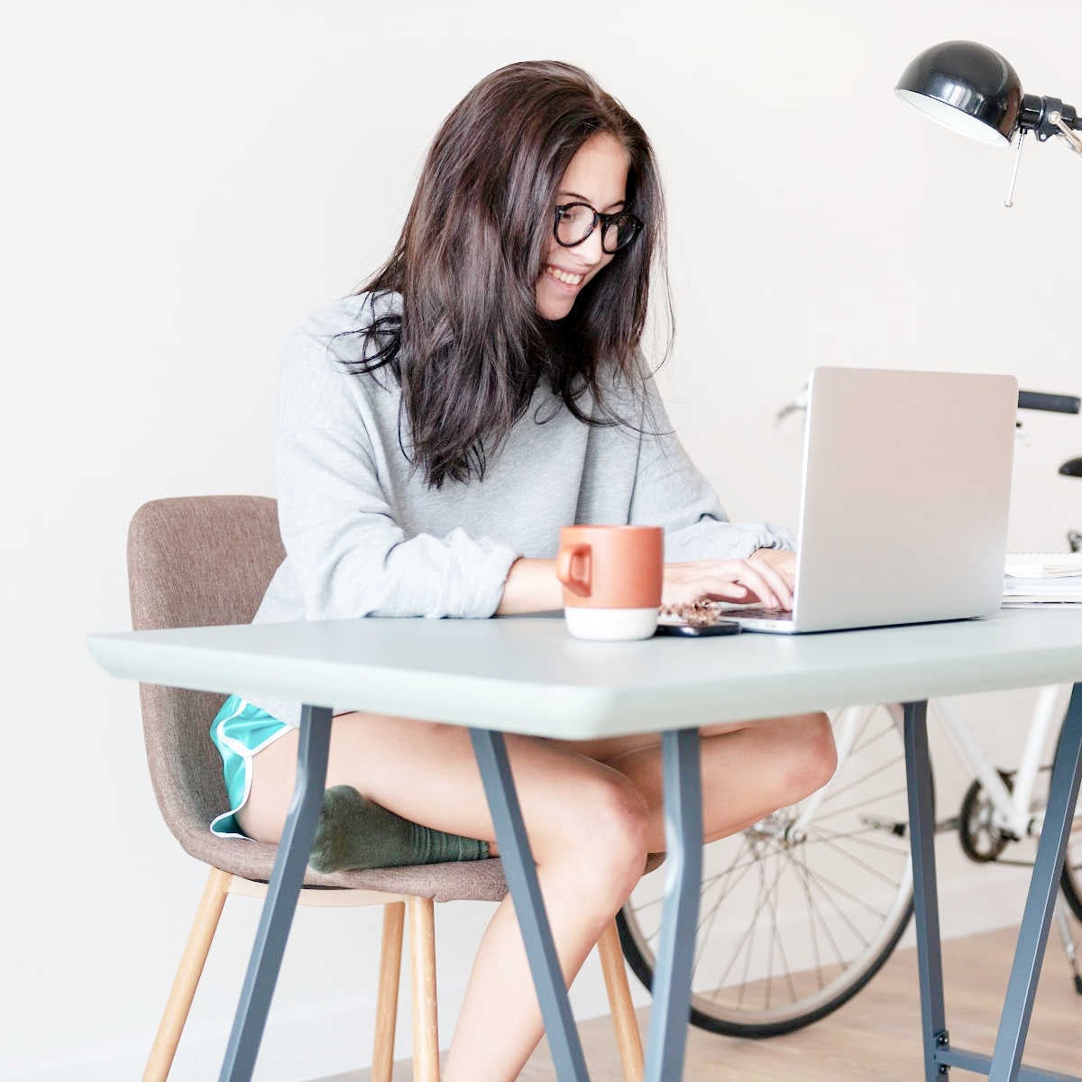 Smiling woman working at desk