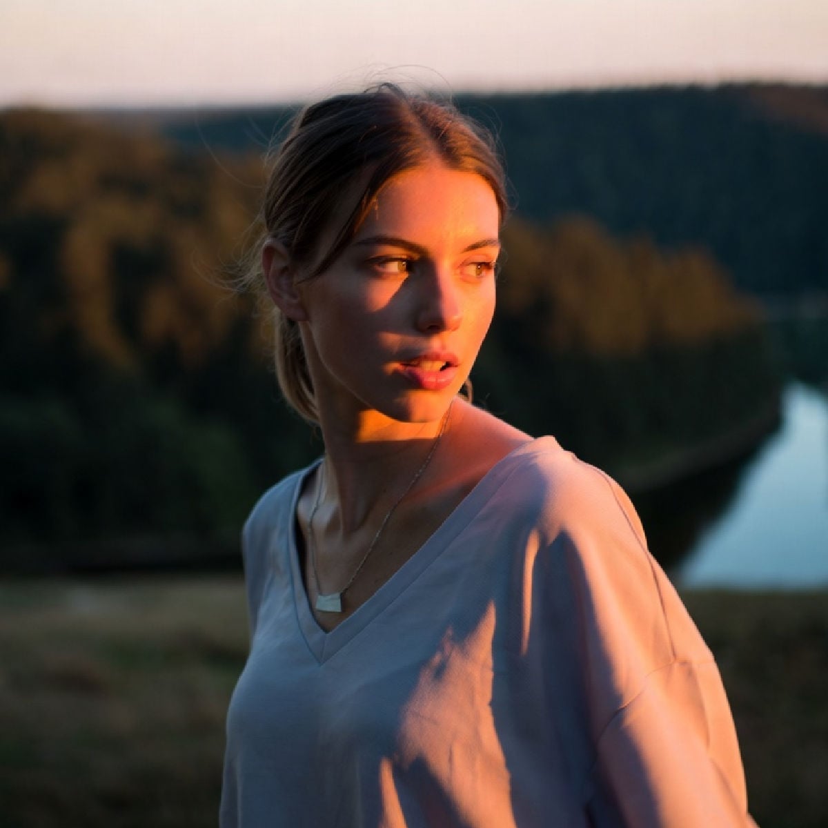 Woman looking at sun set