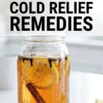 Mason jar of homemade cold relief remedy on kitchen worktop