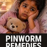 Young girl in bed with teddy bear unable to sleep