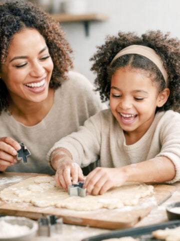 Mother and child baking together