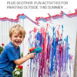Young boy painting outdoors in garden with a water pistol