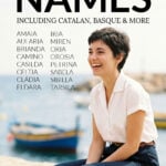 Young Spanish woman sitting in a harbour in Catalonia